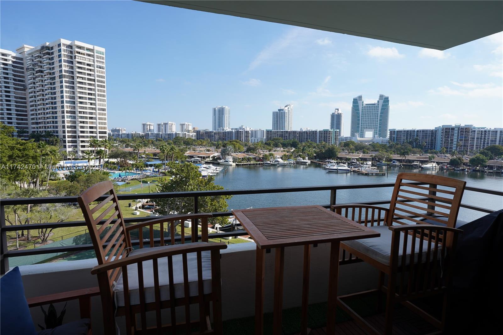 Enjoy waterfront living in this beautifully updated 2BR/2BA condo at Olympus in Hallandale Beach! This 1,400 sq. ft. home features a renovated kitchen with stainless steel appliances, crisp white cabinetry, and a designer backsplash. Tile floors throughout, updated bathrooms, new AC, and oversized bedrooms with walk-in closets. Take in serene marina views from every window and your private balcony. Resort-style amenities include pools, tennis, gym, valet, covered parking and available boat slips for up to 30-ft vessels. Minutes from FLL Airport, Hallandale Beach, Aventura Mall, Casino's & I-95. Easy to show – schedule your tour today!