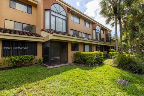 Photo of 15525 Miami Lakeway N #106-8, Miami Lakes, FL 33014 (MLS # A11873409)