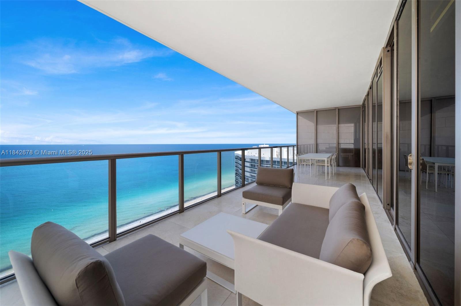 Live the ultimate resort lifestyle at the iconic St. Regis Bal Harbour. This beautifully upgraded designer-furnished residence is suitable for large families and for entertaining. Enjoy breathtaking direct ocean and city skyline views from the spacious layout that features open concept living and dining areas, three expansive terraces, a designer Pininfarina kitchen, and a custom bar area. Residents enjoy St Regis’ five-star amenities, white-glove service, and an unbeatable location just steps from Bal Harbour’s world-renowned dining and luxury shops.