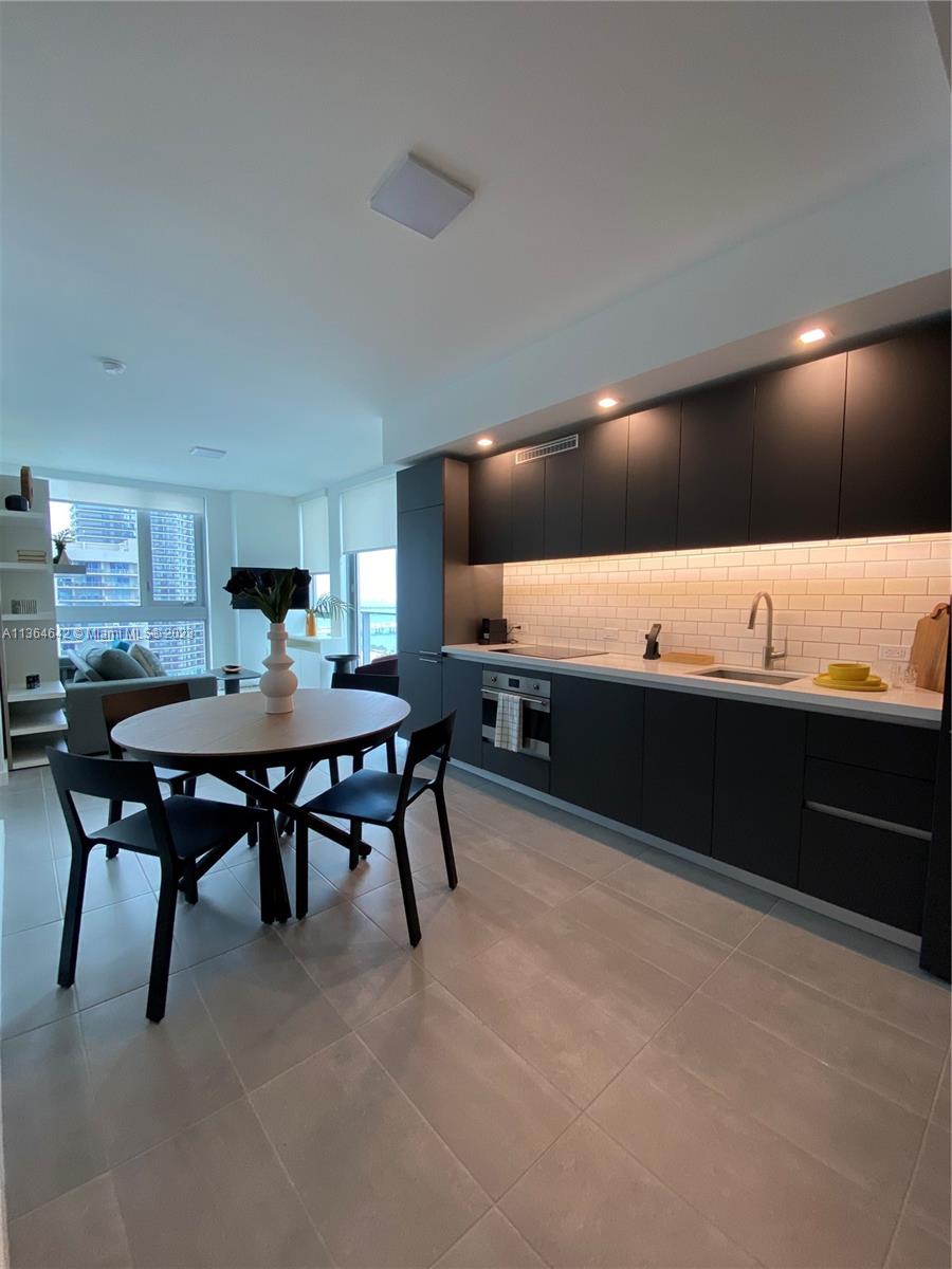 227 NE 2ND STREET CONDO - Residential Lease