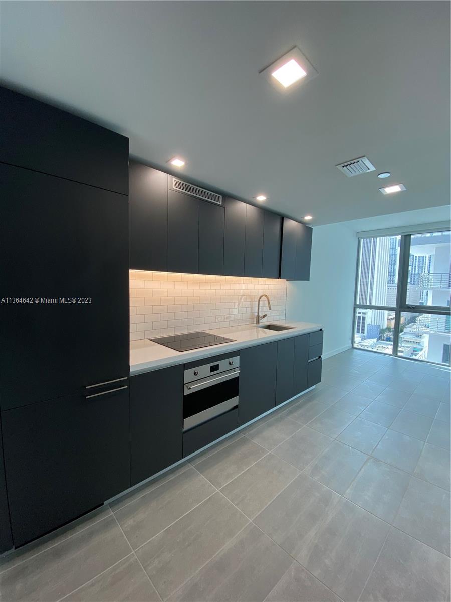 227 NE 2ND STREET CONDO - Residential Lease