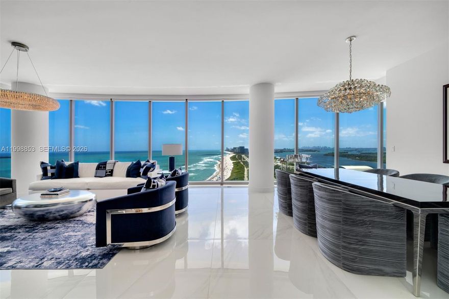 Rarely available at the Ritz Carlton Sunny Isles, the "05" line is the building's crown jewel. Prized for its south facing ocean views & sweeping 270-degree panoramas that stretch from the Atlantic waters to the glow of downtown Miami. This 4bed/5.5 bath residence features 10 ft walls of glass that flood the interior with light, while a sprawling terrace wraps the residence for seamless indoor-outdoor living. A private elevator opens directly into the foyer, where designer tile, integrated Lutron lighting, and a Snaidero kitchen with Gaggenau appliances reflect a thoughtful level of finish. Ownership includes access to the full Ritz-Carlton experience: signature spa, club lounge, in-house dining, advanced fitness & wellness facilities, supervised Kids Club, & private cabana beach service.