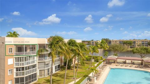 Photo of 7694 Granville Dr #412E, Tamarac, FL 33321 (MLS # A11953989)