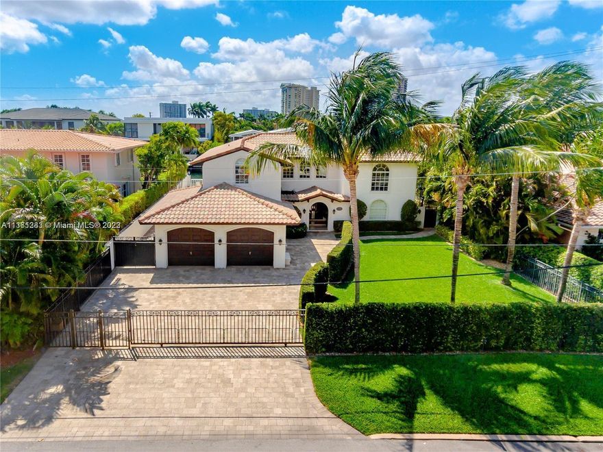 SECLUDED GAURD GATED COMMUNITY in "THE ESTATES OF SANS SOUCI". A RARE FIND ONLY 3RD LOT OFF THE "WIDEBAY" . 75' OF DEEPWATER DOCKAGE 20000lb. BOATLIFT *DIRECT OCEAN ACCESS* 4BR,4.5BA | SUNSHELF POOL | APPROX 4400 SF & 2 CAR GAR. Enter this Mediterranean exterior, You walk into a completely updated modern designed interior w/24' porcelain glass flooring, exquisite finishes! Open High foyer 1st and 2nd floors solid concrete! Large vaulted ceiling bedrooms, Modern Glass tile baths, Gourmet center island designer italian style kitchen, Huge Master Suite with custom walk-in closet, jacuzzi tub and separate body-spray shower. New schools,new medical centers,5 min to beaches