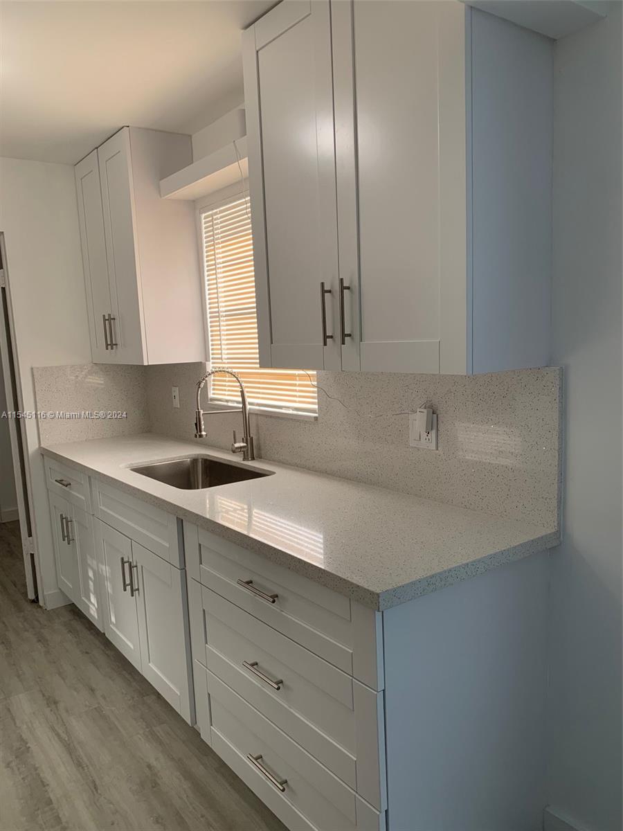 Remodeled single family home in a beautiful neighborhood, 3 bedrooms 2 bathrooms with huge yard fenced all around, formal laundry room, walking closets, sewer service (no septic tank), 6 years old roof, new bathrooms new plumbing, new kitchen and electrical system, new floor and much more. Seller willing to contribute a bit toward buyers rate buydown.