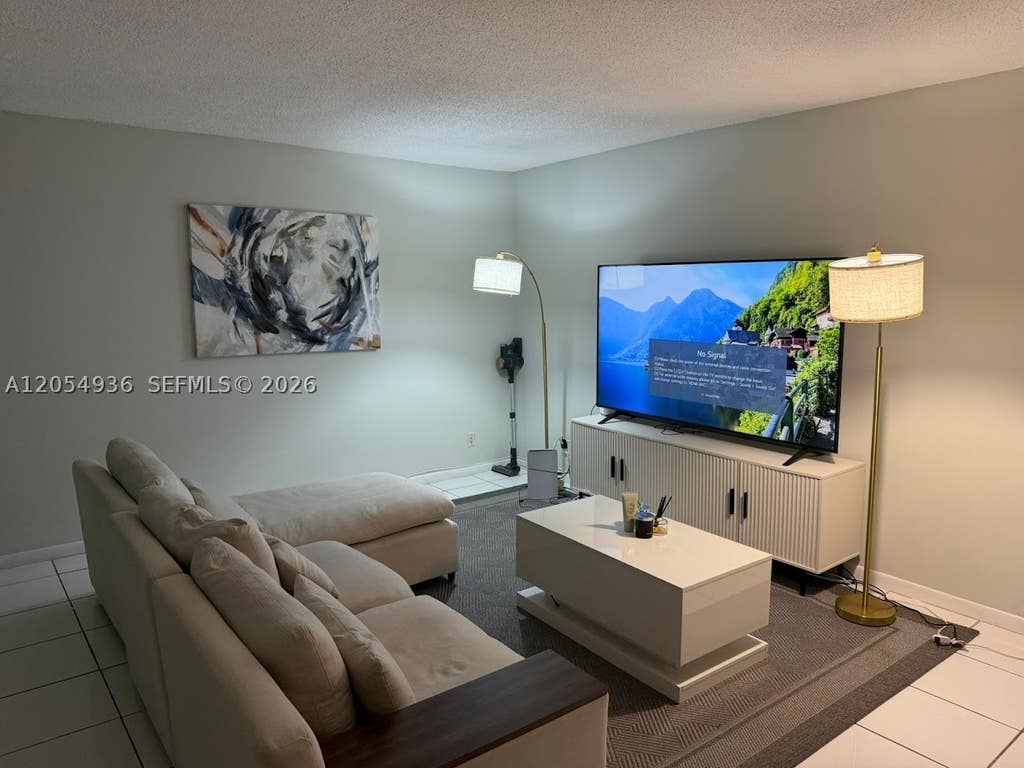 Photo of 2420 Diana Dr #302, Hallandale Beach, FL 33009 (MLS # A12054936)