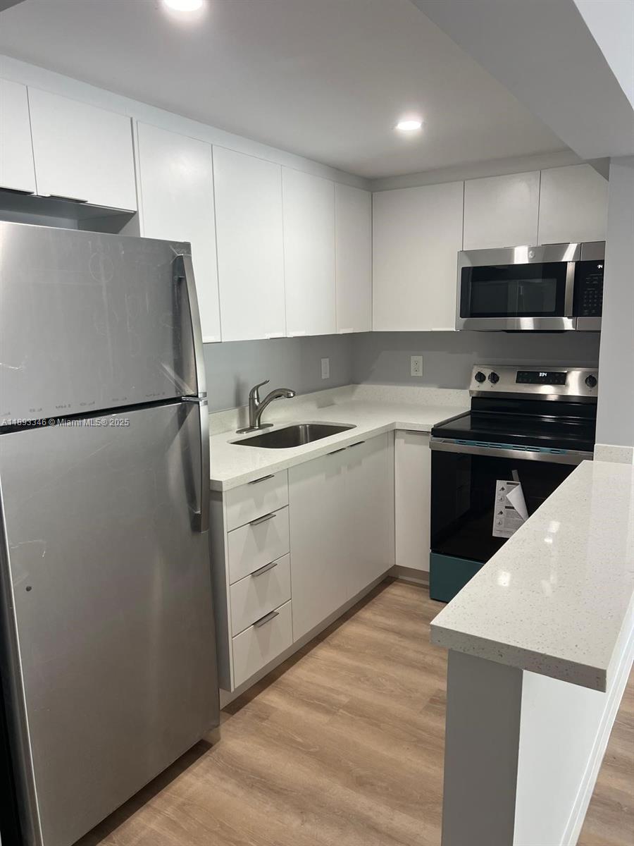Gorgeous and new duplex apartment that offers a wonderful layout with one bedroom and 1.5 baths. Apartment has a balcony, Central AC and an open kitchen. Beautiful floors throughout! All new appliances! Laundry room and on-site parking. Located on the Vibrant Upper Eastside just a few blocks to cool restaurants and bars. Be the first to live in this beautiful spacious apartment