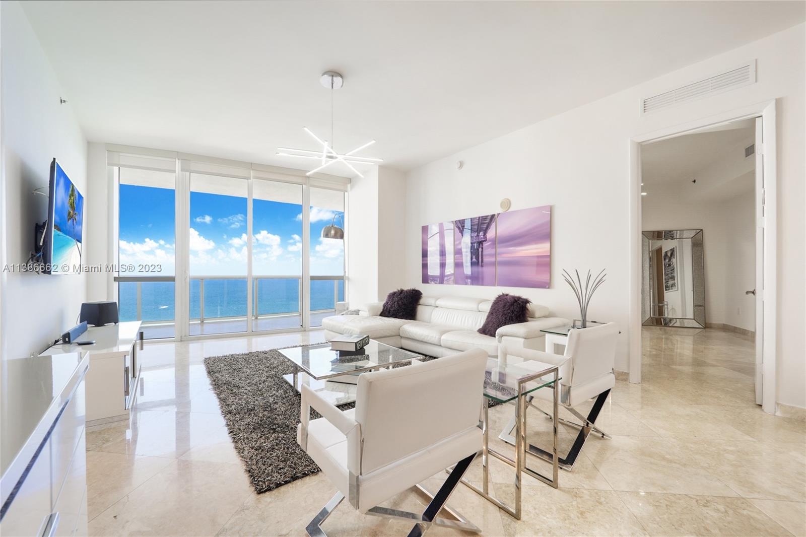 Available from July 25, 2023 – June 30, 2024. Also available for seasonal 6 month rental. Spectacular, breathtaking, direct ocean view, home in the sky offered fully furnished. Marble floors throughout, floor to ceiling windows,10' ceilings, Italian cabinetry in kitchen with Sub-Zero and Wolf appliances. 3rd bedroom is an enclosed den without a window and a private en-suite bathroom. Full-service beach front building with state-of-the-art spa & fitness center with ocean views, beach & pool service, concierge, beachside dining, social room, conference center, 24 hour security and valet. Close to Bal Harbour Shops and restaurants.