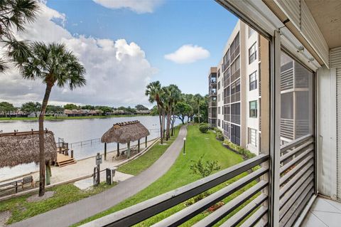 Photo of 1100 Colony Point Cir #205, Pembroke Pines, FL 33026 (MLS # A11887412)