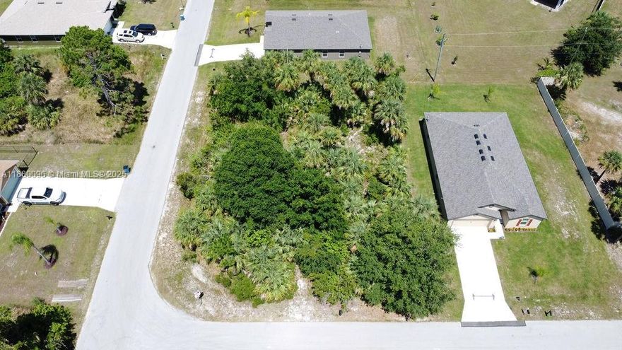 Discover a rare opportunity to own a 0.29 acre corner lot in Palm Bay Florida, perfect for residential development. This spacious and well positioned vacant residential lot is located in a peaceful neighborhood, offering easy access to mayor roads, schools, shopping and local amenities. As a corner lot, it provides added flexibility for custom home designs, multiple driveways options, and added curb appeal. With Palm Bay real estate rapidly growing, this lot is ideal for homebuyers, builders or investors looking to capitalized on Florida's booming housing market. No HOA fees. This is a high demand area with strong investment potential. Don't miss out-secure this corner lot today.