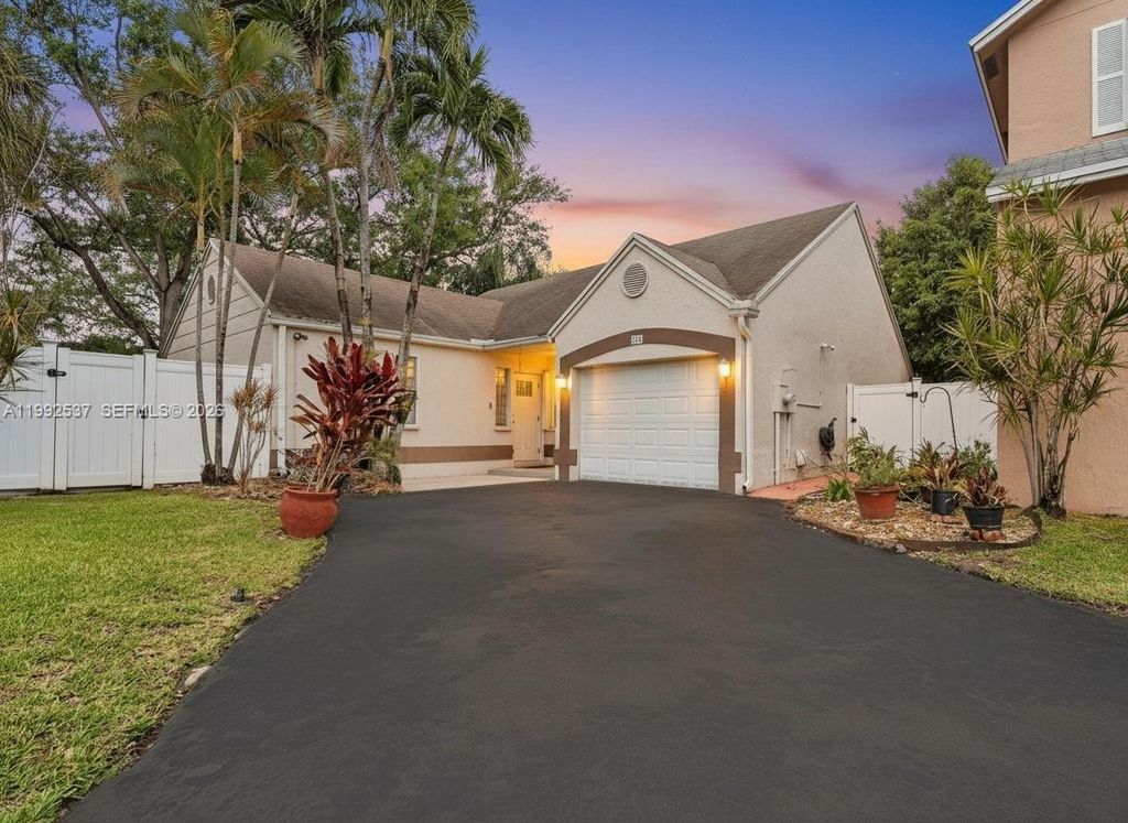 Photo of 371 NW 101st Ter, Pembroke Pines, FL 33026 (MLS # A11992537)