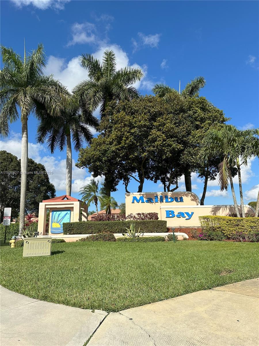 Welcome to this beautifully maintained 3-bedroom, 2-bath townhome with 2 parking spaces, in the highly sought-after Malibu Bay community of Pembroke Pines! Perfectly located with easy access to I-75 and Okeechobee Road, commuting is a breeze whether you’re headed to Miami, Fort Lauderdale, or anywhere in between. Enjoy the convenience of being just minutes away from shopping centers, restaurants, parks, and many options. Located in a top-rated school district, ideal for families and professionals. The gated community offers resort-style amenities including a pool, clubhouse, fitness center, tennis court and playgrounds—making it a desirable place to live. With spacious living areas, this townhome is a nice option in today’s rental market. Don’t miss the opportunity!