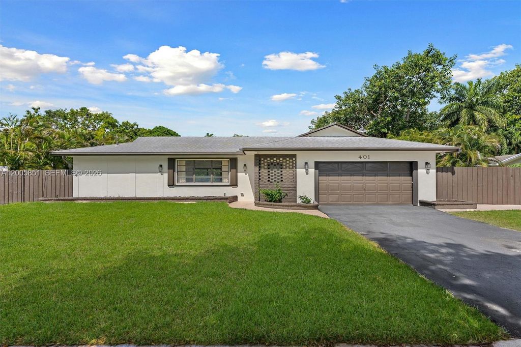 Photo of 401 SW 63rd Ter, Plantation, FL 33317 (MLS # A12005851)