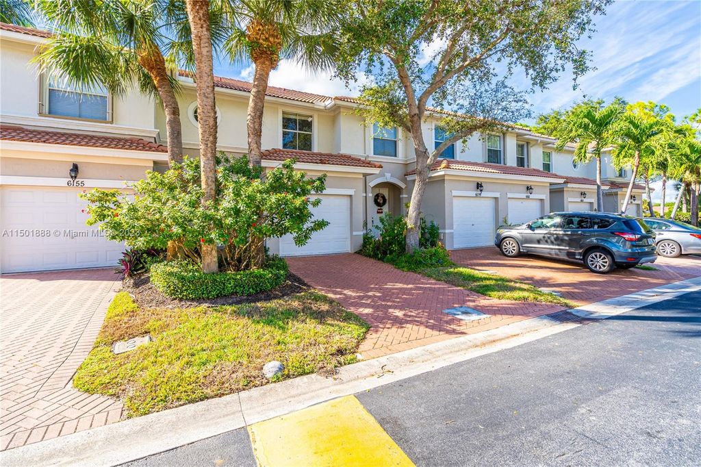 Photo of 6157 Seminole Gardens Cir #6157, Riviera Beach, FL 33418 (MLS # A11501888)