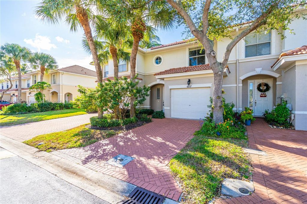 Photo of 6157 Seminole Gardens Cir #6157, Riviera Beach, FL 33418 (MLS # A11501888)