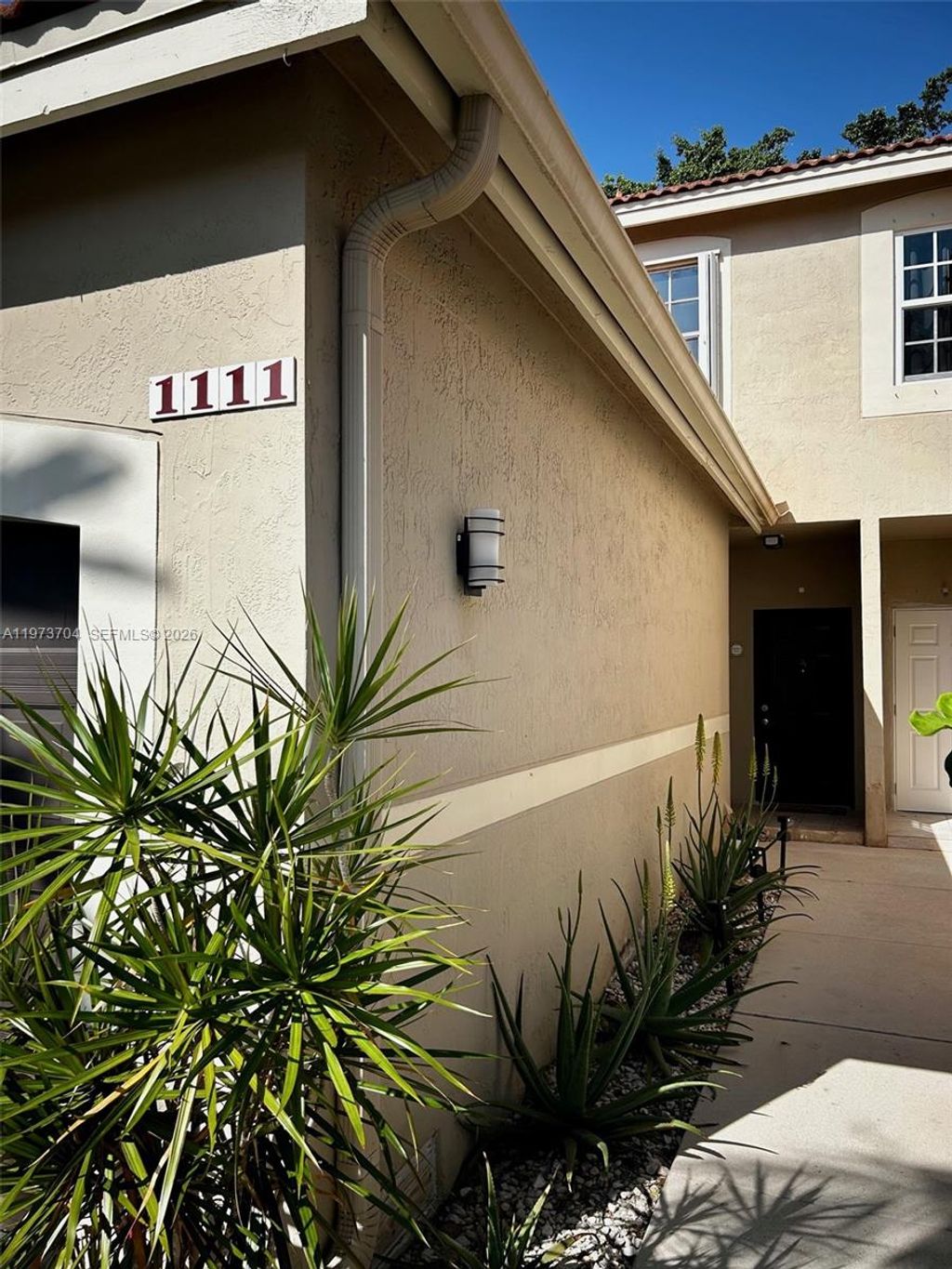 Photo of 1111 Sorrento Dr #1111, Weston, FL 33326 (MLS # A11973704)