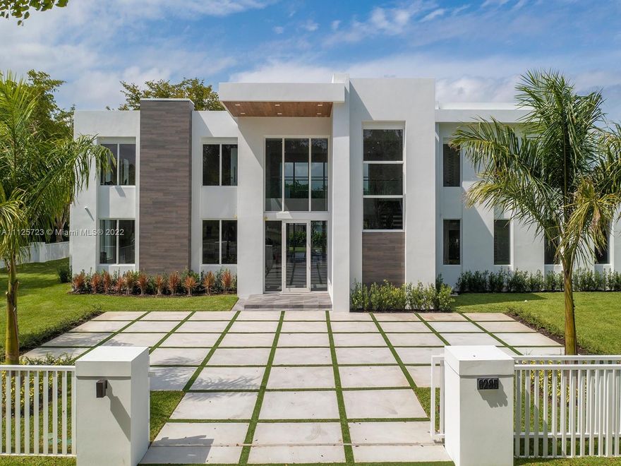 Extraordinary brand-new 2-story modern estate offering high end finishes, details & nearly ready for occupancy in Spring 2022. Greeted by a beautiful open floorplan featuring volume ceilings & enormous flr to ceiling impact windows & drs. Chefs eat-in kitchen w/ custom cabinetry, Wolf/SubZero appl, quartz counters, walk-in pantry, wine cellar & spacious family rm & living rm. Master Suite located upstairs w/double walk-in closets, spa style bathrm w/ his/her water closets & offering gorgeous views of the outdrs from large balcony. Discover an extravagant resort-style backyd w/large swimming pool/spa, tanning ledge, covered terr, summer kitchen, storage & expansive yd. Additional Features: fully gated, service quarters, laundry rm, cabana bath, 3 car gar. Elite Schools nearby.