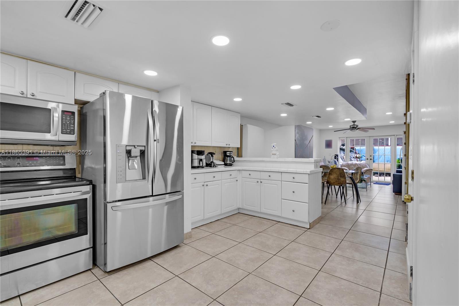 Prime Hialeah Location with easy access to Miami and surrounding areas. 4bedroom/3 bath - 2 stories -Condo/Townhome. Updated and spacious kitchen, patio, and a second floor enclosed balcony.