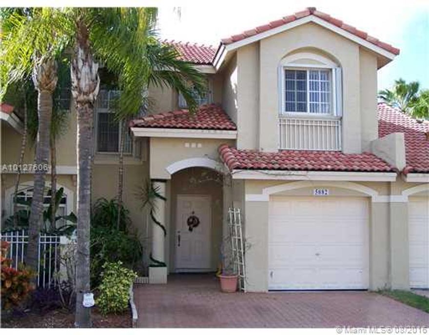 Beautiful Townhouse in Doral Landings West. 3 beds, 2 1/2 baths. Excellent condition. Tiled living room and kitchen. Laminated wood floors in bedrooms. Gated community with private security, swimming pool, greenbelt, playgroung and basketball court. Not a Foreclosure or Short Sale.