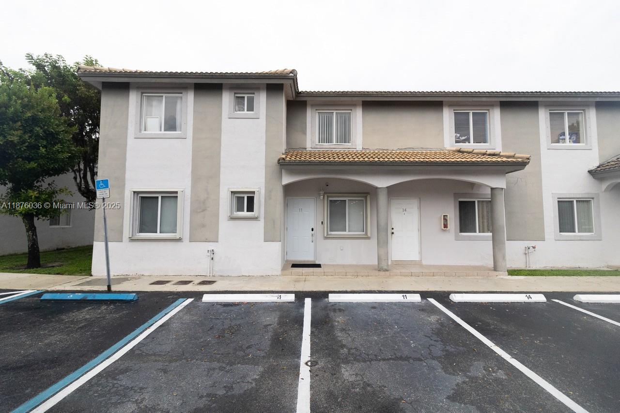 Ground floor corner unit featuring three bedrooms and two full bathrooms. Fully remodeled and in excellent condition. Enjoy a private fenced patio with canal views on 58th Street. The unit includes in-unit laundry, closets, and two parking spaces conveniently located right in front of the unit. Excellent location with easy access to major highways, surrounded by supermarkets, gas stations, schools, recreational areas, shopping centers, a variety of stores, restaurants, and banks. Easy to show!