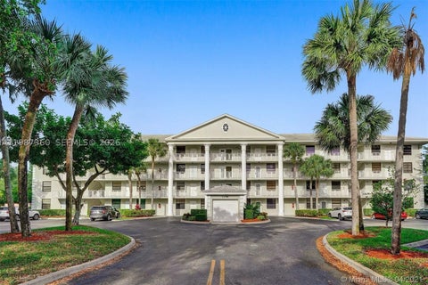 Photo of 1715 Whitehall Dr #202, Davie, FL 33324 (MLS # A11987360)