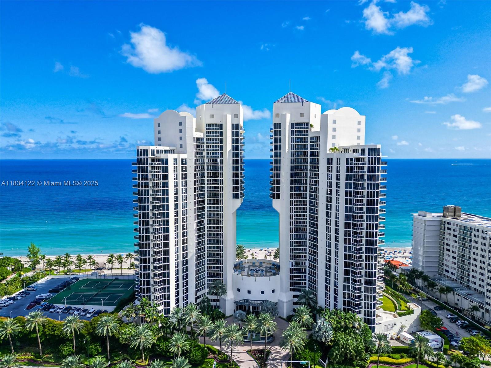 Step into the elegance of Lower Penthouse living with this spacious flow-through sky residence, offering panoramic views of both the Atlantic Ocean and the Intracoastal. Arrive in style via your private elevator lobby and enter a beautifully designed 2-bedroom, 2.5-bath home that blends comfort and sophistication. The open-concept kitchen is equipped with brand-new stainless-steel appliances, including a cooktop, double oven, microwave, refrigerator, and dishwasher, perfect for both entertaining and everyday living. A walk-in pantry provides exceptional storage, while a detached laundry room, off foyer, features a full-size washer and dryer for added convenience. Additional highlights include built-in closets, blinds, and refined finishes throughout.