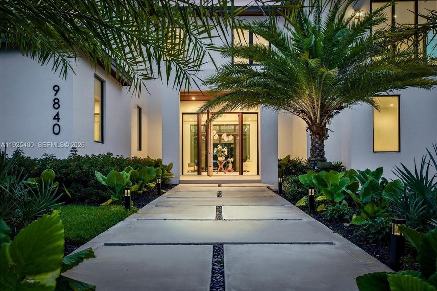 Unique 2026 New Construction in North Pinecrest, ideally located just minutes from major roads and highways, offering seamless connectivity while maintaining privacy and exclusivity. Experience Pinecrest living at its finest in this classic-with-a-modern-twist masterpiece, offering 8,143 sq. ft. of total construction. Perfectly positioned on a 15,225 sq. ft. corner lot, this 6-bed, 7.5 bath luxury residence was designed for those who appreciate sophisticated craftsmanship, and effortless indoor–outdoor living. Step into a home bathed in natural light, enhanced by expansive windows and double-height panoramic views in the main living room. The open layout is complemented by a chef-inspired kitchen featuring top-tier luxury appliances, wolf and subzero, an oversized island, and a walk-in pantry.Sparkling saltwater pool, heated spa/jacuzzi, and outdoor areas. A 3-car garage with lift capability plus an additional 8-car driveway capacity. A massive primary suite, a true sanctuary with a spa-inspired bath featuring a wet room, dual vanities, and a spectacular custom oversized closet that feels like its own boutique. Each Suite offers ample space, en-suite bathrooms. Curated integration of Valentina Bilbao’s fine art. This home isn't for everyone; it's for those seeking expansive interiors and the confort of a spacious new construction, yet with a more manageable lot. Offering exclusivity, paired with ahome designed for those who appreciate luxury without the excess.