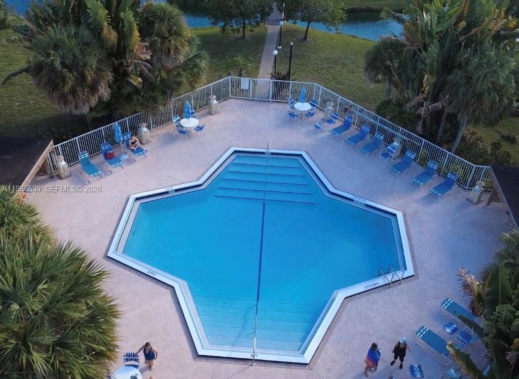 Photo of 5061 W Oakland Park Blvd #211, Lauderdale Lakes, FL 33313 (MLS # A11935539)