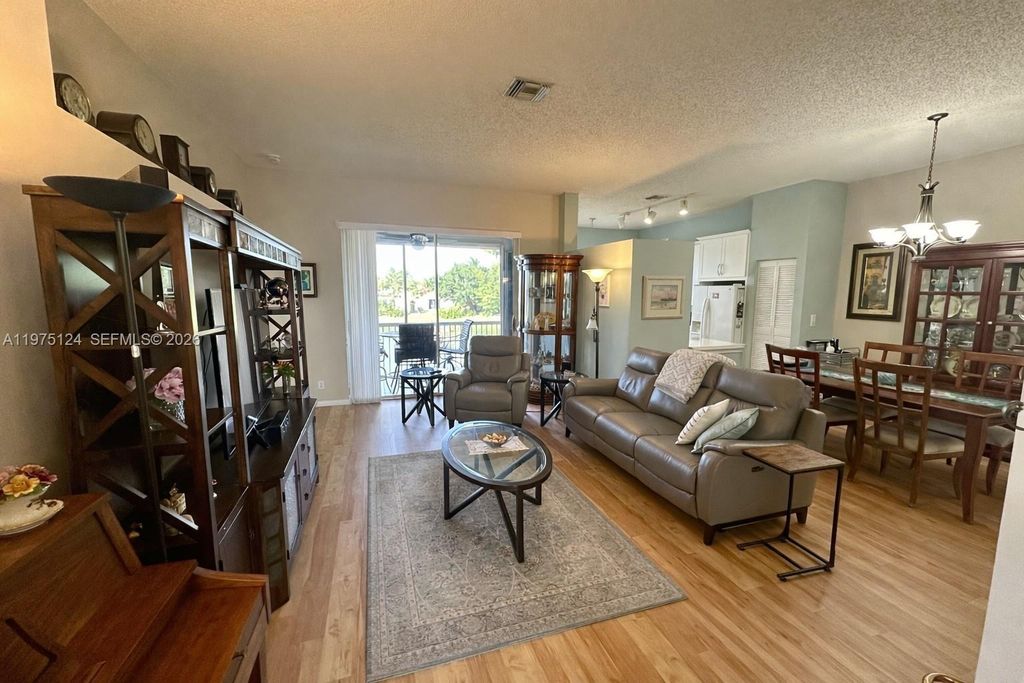 Photo of 14911 SW 15th St #14911, Pembroke Pines, FL 33027 (MLS # A11975124)