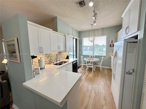 Photo of 14911 SW 15th St #14911, Pembroke Pines, FL 33027 (MLS # A11975124)