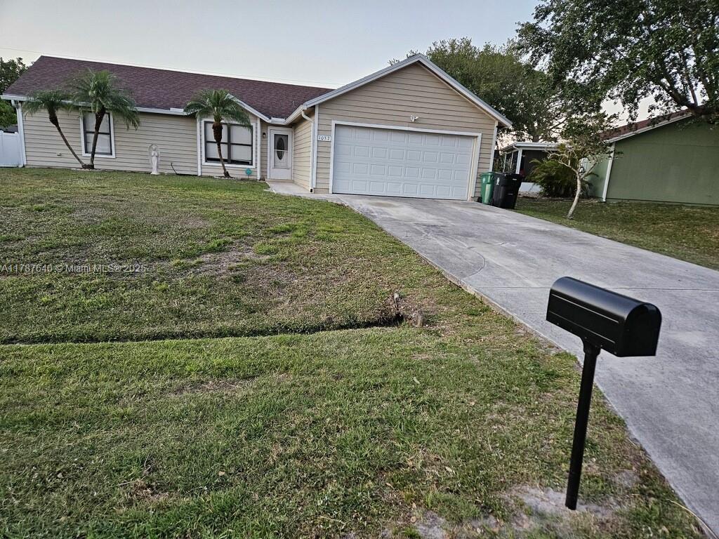 Great Location - 3/2 single family home with garage. Split floor plan with eat in kitchen and primary en suite. Large screened in porch and spacious yard with room for a pool! Close to shops, schools, I-95 and turnpike!