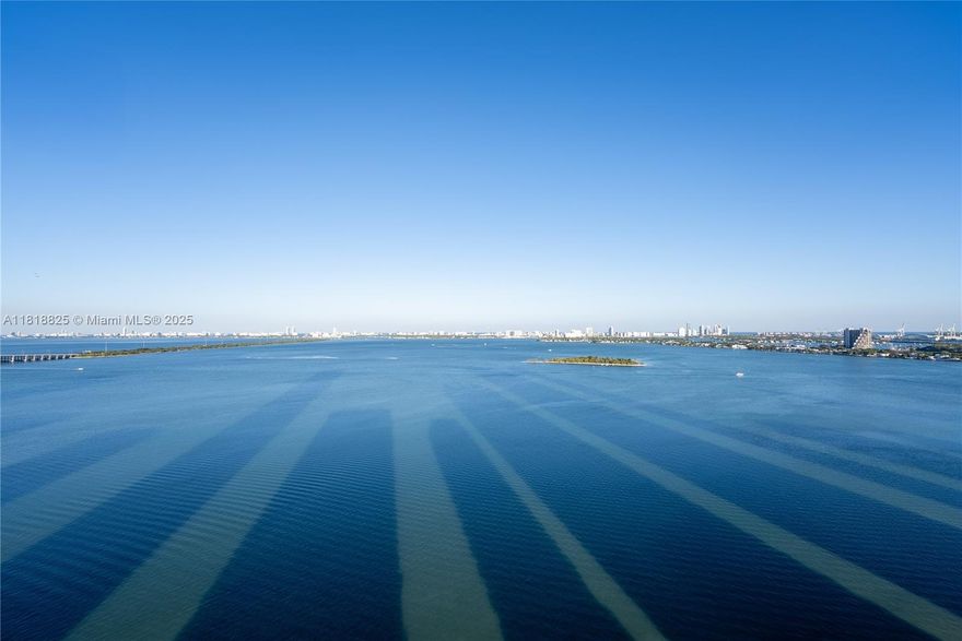 Available Immediately! Step into luxury in this fully renovated, corner-unit sky residence offering over 1,500 SF of refined interiors and panoramic bay and city views. Perched high in a boutique Edgewater building, this 2 bed, 2 bath home features Wolf & Sub-Zero appliances, quartzite countertops, new AC, electric blinds, and custom finishes throughout. Floor-to-ceiling windows flood the space with light, while the expansive balcony captures unforgettable sunrises. Renovated Summer 2024 with new flooring, washer/dryer, and spa-like baths. Assigned two parking spaces & no assessments - just minutes from Midtown, Wynwood, Design District, and Downtown Miami. A rare trophy unit with no compromise.