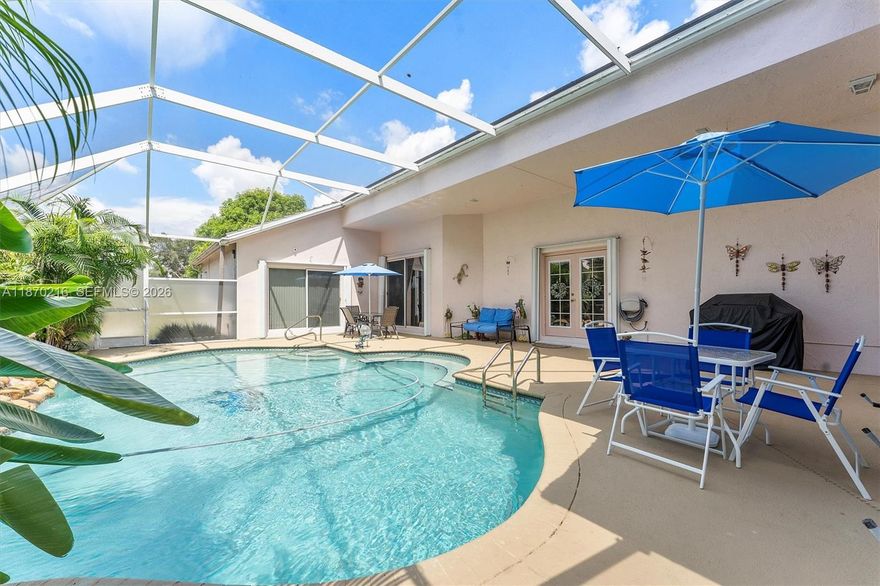 Open House Sunday 12-2pm. Courtyard pool home on a quiet cul-de-sac in Delray Beach! 3BR + den (optional 4th), 3BA with a bright open layout and seamless indoor-outdoor living. Fully enclosed courtyard features an inground pool with fountain and lush tropical landscaping—perfect for entertaining. Spacious primary suite with pool views and ample closet space. Detached 3rd bedroom with updated ensuite ideal for guest house, in-law suite, office, or studio. Multiple patios, oversized lot, 2-car garage, and close to shopping, dining, Atlantic Blvd, Downtown Delray & beaches. Well maintained with major updates already completed—Roof 2020, AC 2021, Gas tank 2025, , brand new refrigerator and dryer, hybrid oven/stove—ready for immediate enjoyment!