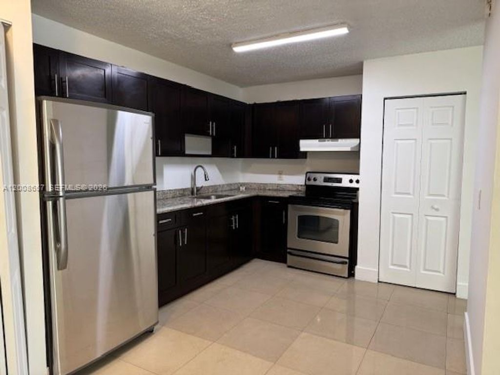 Photo of 5323 NW 24th St #118, Lauderhill, FL 33313 (MLS # A12008657)