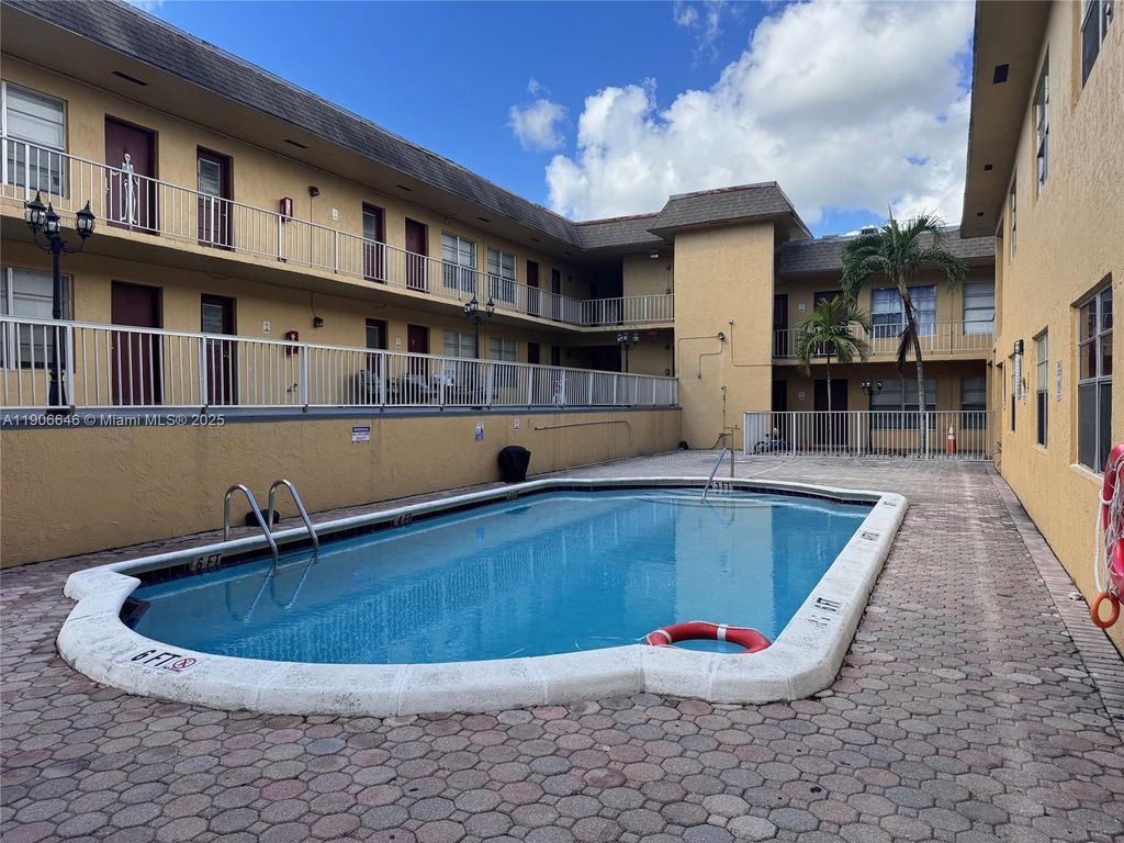 Photo of 6840 Pembroke Rd #203, Pembroke Pines, FL 33023 (MLS # A11906646)