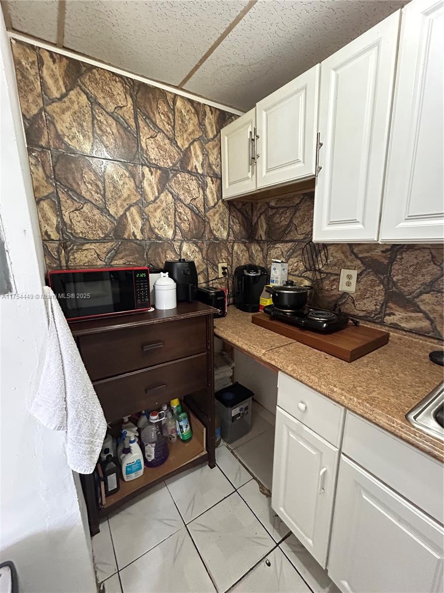 ALTAMIRA GARDENS CONDO - Residential