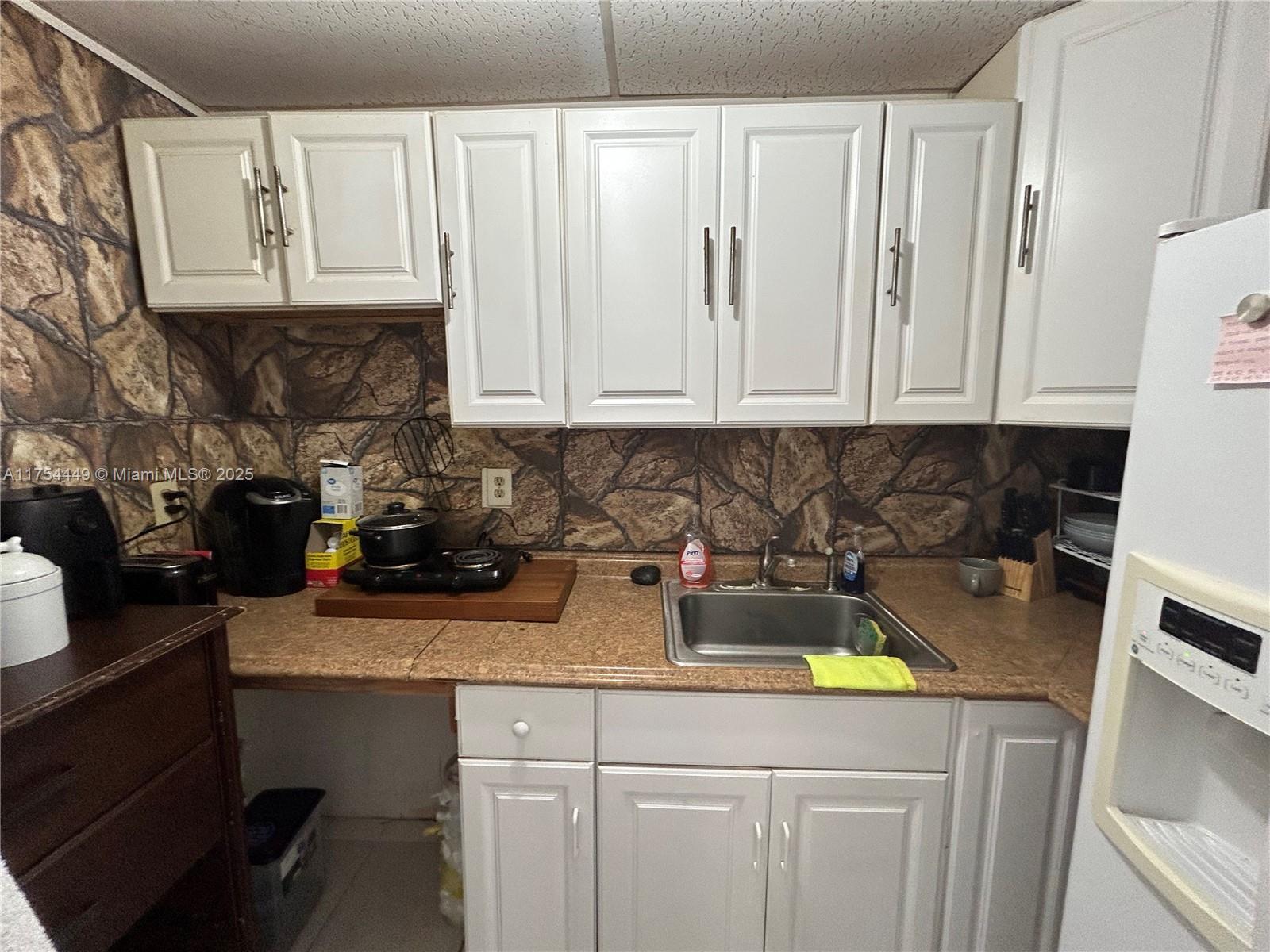 ALTAMIRA GARDENS CONDO - Residential