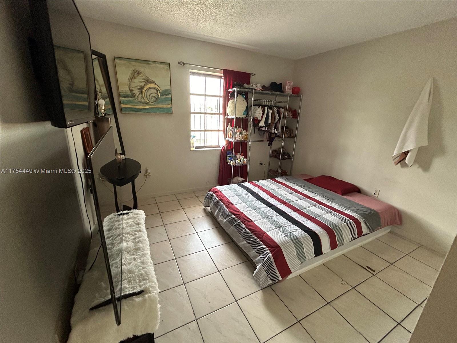 ALTAMIRA GARDENS CONDO - Residential