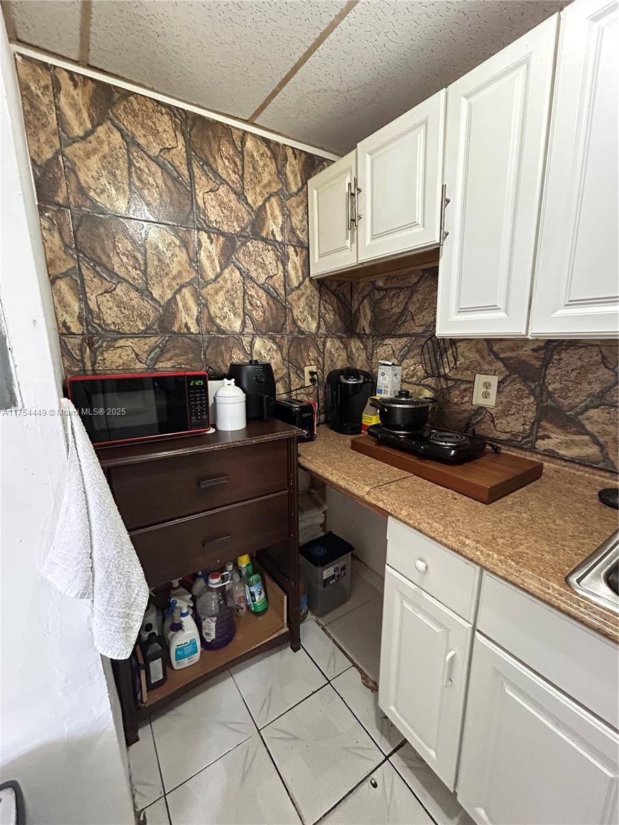 ALTAMIRA GARDENS CONDO - Residential