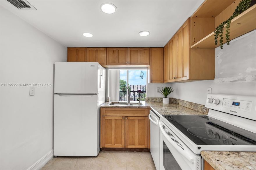 **10,000 TOWARDS YOUR CLOSING COSTS or to BUY DOWN YOUR RATE** Beautiful, updated condo in the Versailles community! Porcelain floors throughout and fresh white walls mixed with large amounts of natural light make this unit a pleasure to live in. Located in a prime location in Miami near FIU, popular dining and shopping spots as well as major expressways. Community will qualify for conventional loans!