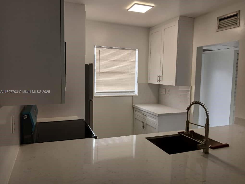 QUINSANA GARDENS CONDO - Residential Lease