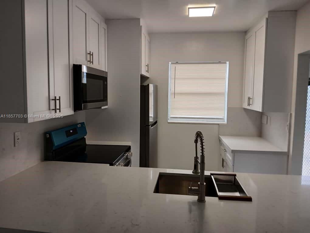 QUINSANA GARDENS CONDO - Residential Lease