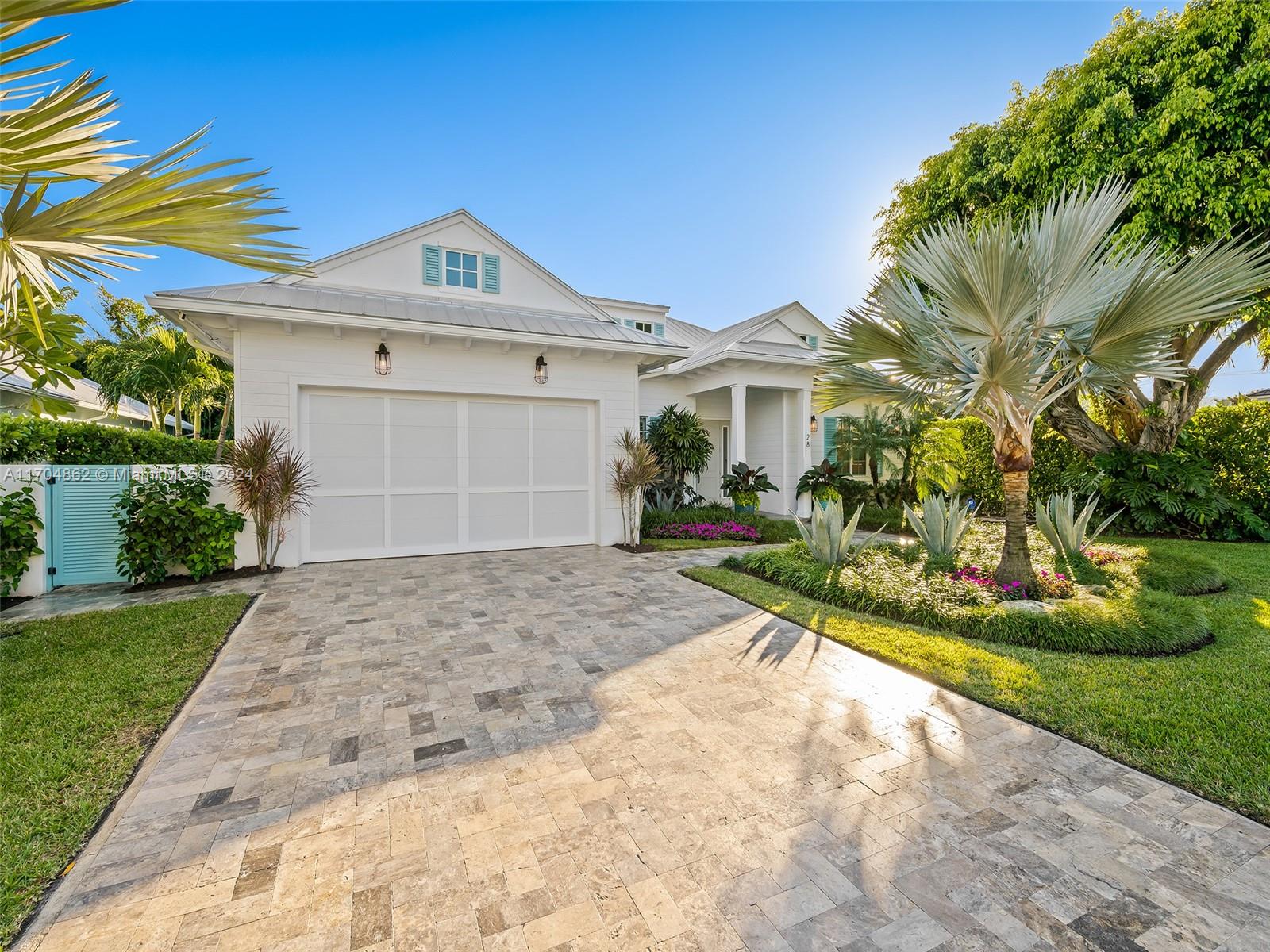 Welcome to 28 NE 9th Street, a stunning Coastal Contemporary custom home built in 2018 by the renowned RTG Construction, featuring exquisite interior designer finishes. This 3-bedroom + den, 3.5-bathroom residence offers vaulted ceilings, white oak hardwood floors, chef-inspired kitchen that boasts top-of-the-line appliances, natural gas, a full home generator, and a full-home water filtration system.
Enjoy a private outdoor oasis with a heated pool, gas BBQ, bar fridge, and outdoor shower. Located just steps to vibrant Atlantic Avenue and minutes to the beach, this prime location combines the best of coastal living with urban convenience, placing you at the heart of one of south Florida’s most desirable destination. Modern luxury meets coastal charm—Welcome home!