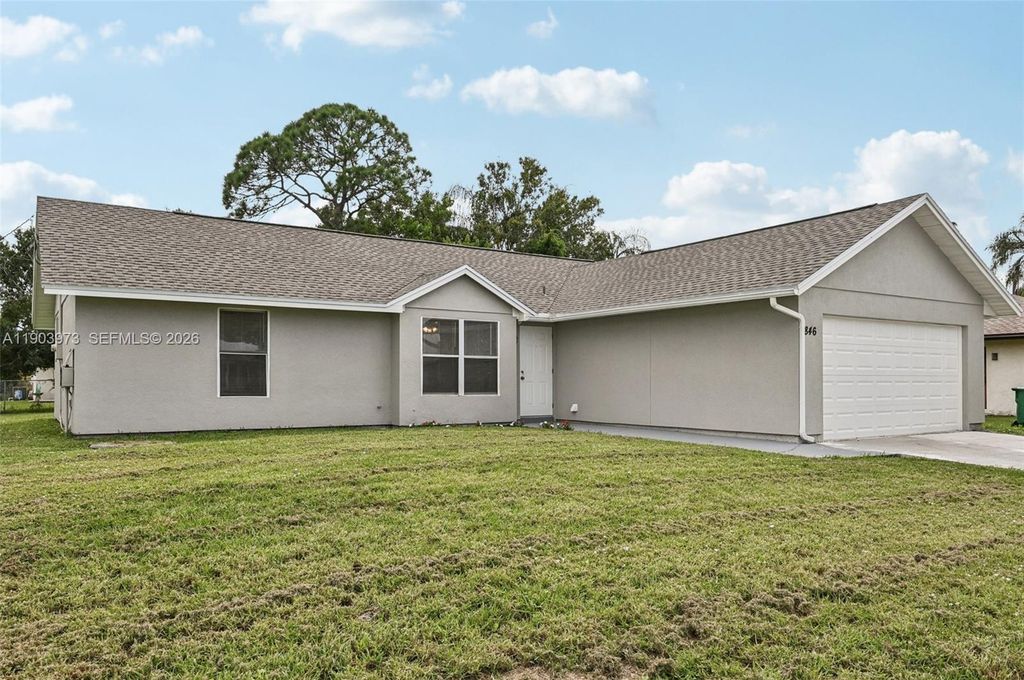 Photo of 846 SE Cavern Ave, Port St Lucie, FL 34983 (MLS # A11903973)