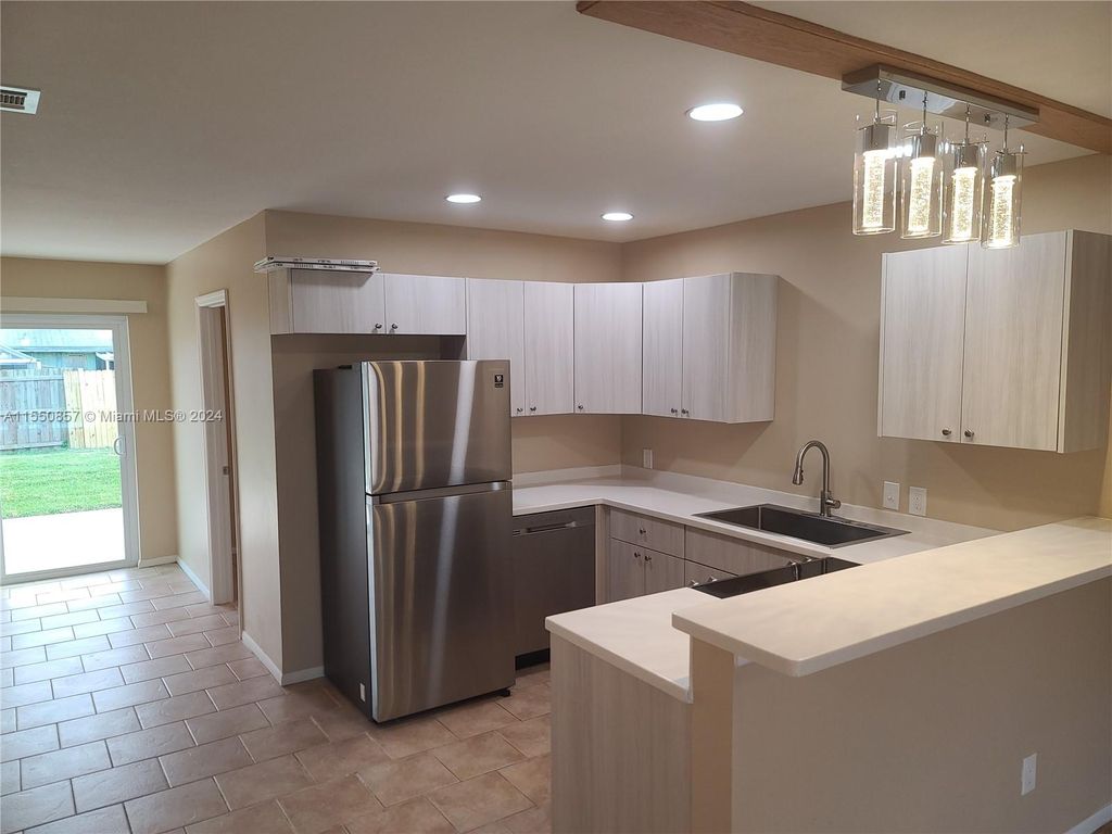 Photo of 32 SE Cayuga Ter, Stuart, FL 34997 (MLS # A11550857)