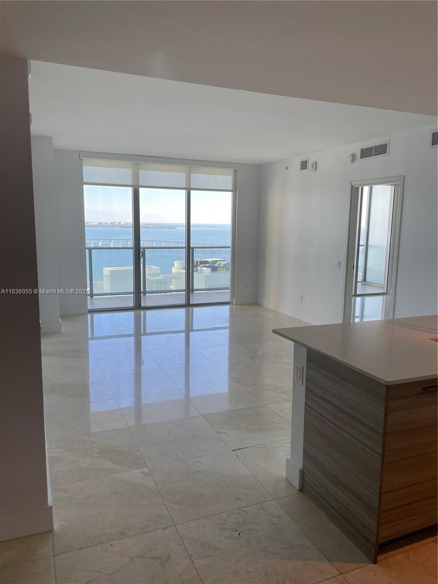 WATER VIEW! 2 bedroom plus Den, 2 baths. Floor to ceiling windows with framing views of the bay. Amenities include: 24hr welcome desk; one parking garage and guest services; resort style mezzanine; family areas; men and women steam rooms; expansive 46th-floor sky deck with pool; fully equipped and technological advanced fitness center; club and lounge rooms.