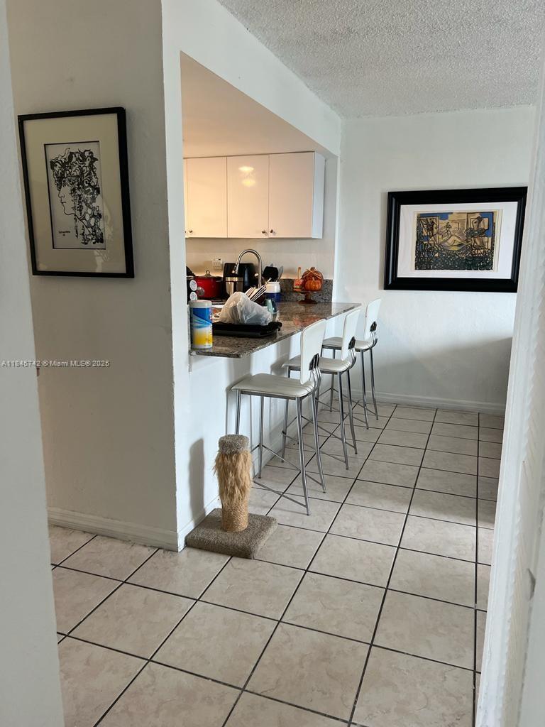 Spacious and bright 2BR/1BA apartment for rent at gated Yolanda Villas. This lovely unit features laminate flooring throughout, a beautifully renovated kitchen with granite countertops and modern cabinetry. The smart layout offers great natural light and comfortable living areas. Enjoy relaxing on your private balcony with views of the pool and tennis courts. Includes 2 assigned parking spaces plus guest parking. The building is impeccably maintained with new elevators and updated common areas. Community amenities include a swimming pool, gym, tennis courts, and lush green spaces. Ideally located near Miami Airport, Coral Gables, shopping, dining, and major highways. A great place to call home!