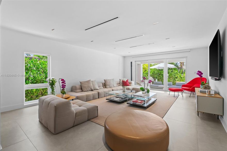 Step into this tastefully fully renovated 4 bedroom, 3.5 bathroom residence located on an oversized 8,400 sq ft lot in the desirable Surfside neighborhood. With 2,267 sq ft of interior space, this home offers a spacious and functional layout. Enjoy seamless indoor-outdoor living with a covered porch (159 sq ft), a summer kitchen ideal for entertaining and a large pool surrounded by landscaping. Features a new kitchen with top of the line appliances. The oversized lot not only offers privacy but also incredible potential for future expansion. Every detail has been thoughtfully designed & updated, offering both style and comfort in a prime location just minutes from the beach, shops, and top-rated schools.