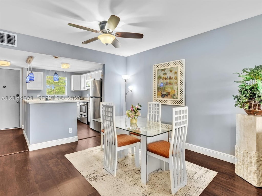 Photo of 700 SE 6th Ave #201, Deerfield Beach, FL 33441 (MLS # A12104571)