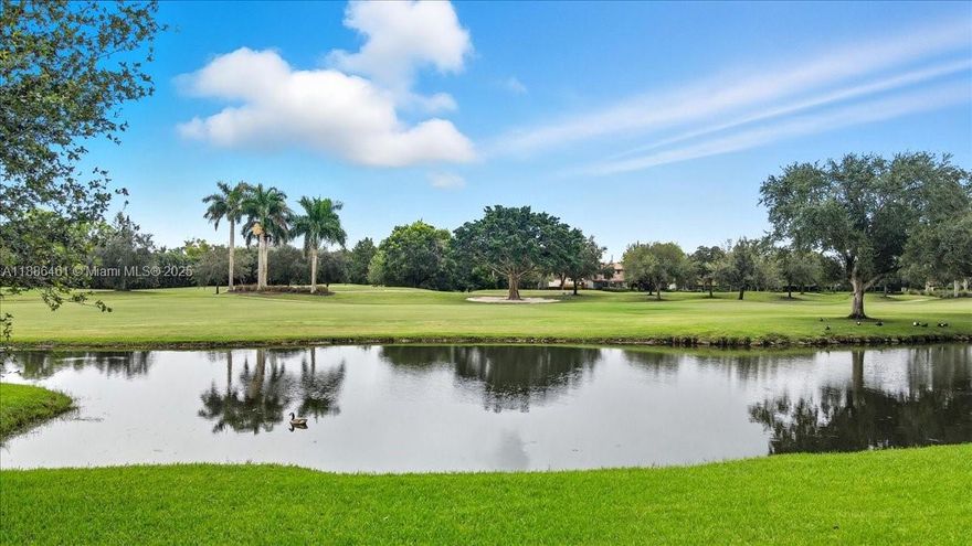 Two units have been thoughtfully merged to create a spacious, 2600 SqFt light-filled retreat of 4 Bedroom 3 Bath and a large balcony that offers a beautiful view of the lake and the renowned golf course.  An open-concept living and dining space pairs with a beautiful kitchen, while the primary suite features a siting area, an office & spa-like bath and a generous walk-in closet with an amazing view. With three additional bedrooms and two more baths, in-unit laundry, and ample storage, this turn-key home embodies refined, comfortable living. Very close to American Heritage School, Sawgrass Mils Mall & easy access to highways. Lago Mar Community is known for its beautiful homes & golf, 24 hour guard gated security entrance. A must see!